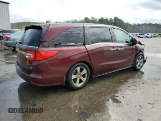 2018 Honda Odyssey EX-L z VIN 5FNRL6H75JB097041, wystawiony jako Copart lot #50617535 z przebiegiem 169 040 mil mil oraz Szkoda całkowita • Salvage title. Historia ofert i sprzedaży dostępna na DreamBid. Obrazek 3.