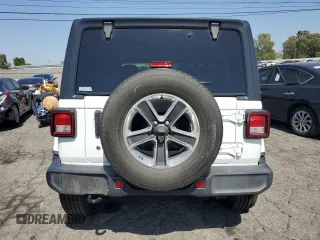 2019 Jeep Wrangler Unlimited Sahara с VIN 1C4HJXEN4KW593522, выставлен на аукционе Copart как лот 57528955 с пробегом 77 382 миль миль и Списание • Salvage title. История ставок и продаж доступна на DreamBid. Изображение 6.
