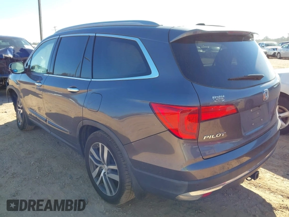 2017 Honda Pilot Touring with VIN 5FNYF5H92HB038893, listed as a IAAI auction lot 41639555 with 100,354 mi miles. Bid and sale history available at carsss.com. Image 3.