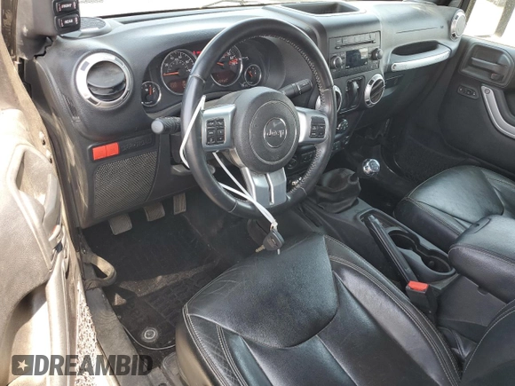 2016 Jeep Wrangler Rubicon z VIN 1C4BJWCG3GL275971, wystawiony jako Copart lot #60329125 z przebiegiem 25 956 mil mil oraz Szkoda całkowita • Salvage title. Historia ofert i sprzedaży dostępna na DreamBid. Obrazek 8.