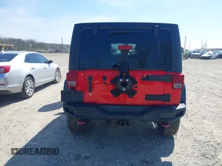 2015 Jeep Wrangler Unlimited Rubicon Hard Rock with VIN 1C4HJWFG9FL525556, listed as a IAAI auction lot 41973576 with 246,949 mi miles and . Bid and sale history available at DreamBid. Image 16.