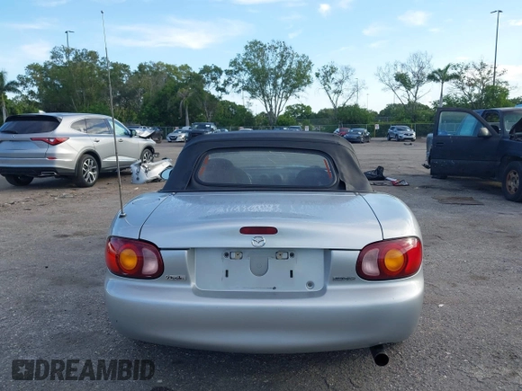 1999 Mazda MX-5 Miata with VIN JM1NB3534X0124237, listed as a IAAI auction lot 42536654 with 92,696 mi miles and . Bid and sale history available at DreamBid. Image 17.