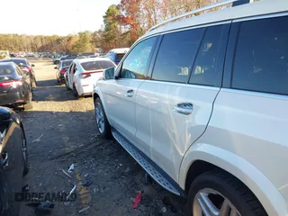 2016 Mercedes-Benz GL with VIN 4JGDF7DE6GA703049, listed as a IAAI auction lot 41063570 with 116,736 mi miles. Bid and sale history available at carsss.com. Image 14.