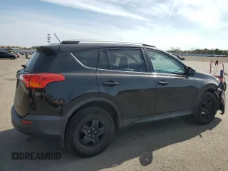 2015 Toyota RAV4 LE with VIN 2T3BFREV0FW296593, listed as a Copart auction lot 54052395 with 106,702 mi miles and Salvage title. Bid and sale history available at DreamBid. Image 3.