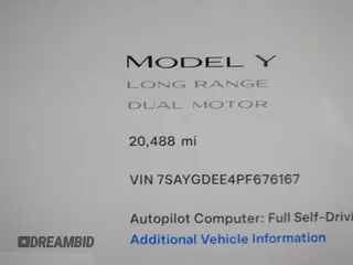 2023 Tesla Model Y Long Range with VIN 7SAYGDEE4PF676167, listed as a IAAI auction lot 42147909 with 20,488 mi miles. Bid and sale history available at carsss.com. Image 16.