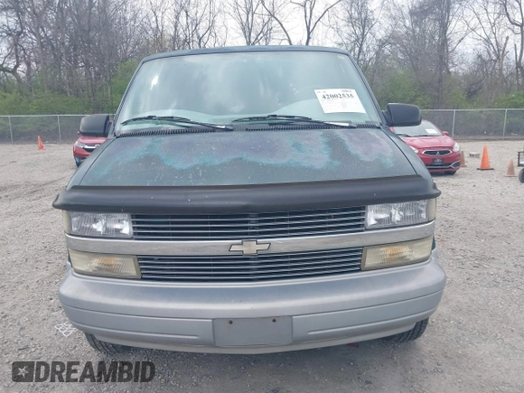 1997 Chevrolet Astro with VIN 1GNDM19W9VB205001, listed as a IAAI auction lot 42002535 with 136,734 mi miles. Bid and sale history available at carsss.com. Image 12.