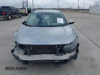 2020 Honda Civic LX z VIN 19XFC2F68LE001482, wystawiony jako IAAI lot #41484428 z przebiegiem 97 604 mil mil oraz . Historia ofert i sprzedaży dostępna na DreamBid. Obrazek 6.