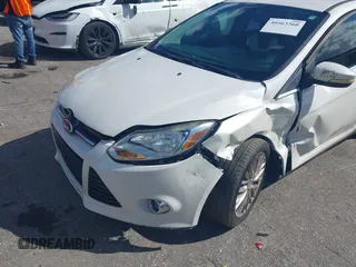 2012 Ford Focus SEL with VIN 1FAHP3H25CL282490, listed as a IAAI auction lot 40563360 with 223,864 mi miles and . Bid and sale history available at carsss.com. Image 6.