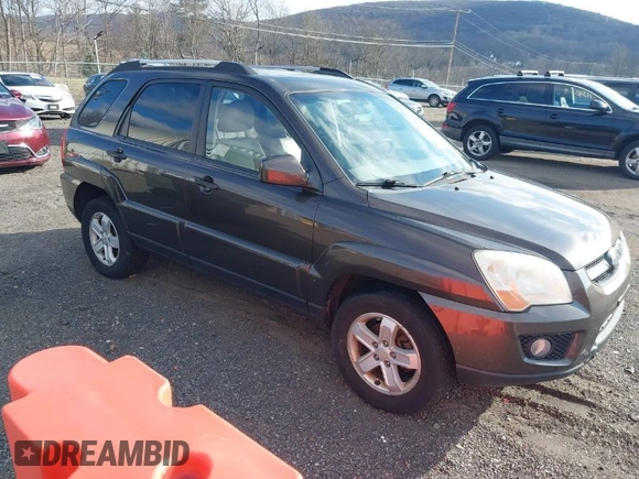 2009 Kia Sportage LX with VIN KNDJE723097623239, listed as a IAAI auction lot 41233933 with 169,444 mi miles. Bid and sale history available at carsss.com. Image 1.