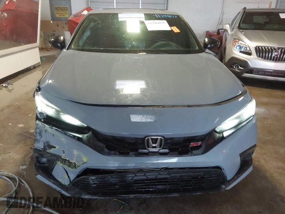 2022 Honda Civic Si with VIN 2HGFE1E59NH472028, listed as a IAAI auction lot 41249075 with 37,970 mi miles and . Bid and sale history available at DreamBid. Image 12.