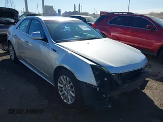 2012 Cadillac CTS with VIN 1G6DC5E59C0116606, listed as a IAAI auction lot 40615414 with 102,610 mi miles and . Bid and sale history available at DreamBid. Image 1.