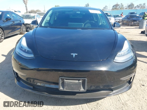 2018 Tesla Model 3 Long Range Battery with VIN 5YJ3E1EA0JF056979, listed as a IAAI auction lot 41865849 with 97,319 mi miles. Bid and sale history available at carsss.com. Image 12.