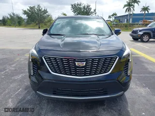 2023 Cadillac XT4 FWD Premium Luxury with VIN 1GYFZCR44PF170452, listed as a IAAI auction lot 42084960 with 22,212 mi miles. Bid and sale history available at carsss.com. Image 6.