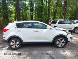 2014 Kia Sportage EX with VIN KNDPCCAC5E7658993, listed as a IAAI auction lot 42679549 with 107,658 mi miles and . Bid and sale history available at DreamBid. Image 13.
