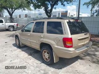 1999 Jeep Grand Cherokee Limited with VIN 1J4GW68S3XC580949, listed as a IAAI auction lot 42502949 with 150,520 mi miles and . Bid and sale history available at DreamBid. Image 3.