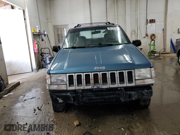 1994 Jeep Grand Cherokee Laredo with VIN 1J4FX58S0RC316030, listed as a Copart auction lot 66178754 with 281,785 mi miles and Salvage Title. Bid and sale history available at carsss.com. Image 5.