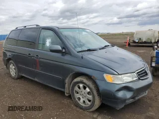2003 Honda Odyssey EX with VIN 2HKRL18603H008412, listed as a Copart auction lot 55310905 with 352,774 mi miles and Salvage Title. Bid and sale history available at DreamBid. Image 4.