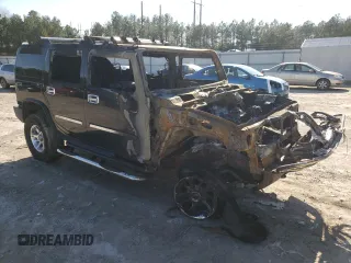 2003 Hummer H2 z VIN 5GRGN23U43H103551, wystawiony jako Copart lot #45456775 z przebiegiem Nie podano mil oraz Nie do naprawy. Historia ofert i sprzedaży dostępna na DreamBid. Obrazek 4.
