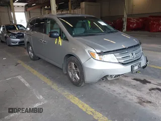 2012 Honda Odyssey Touring with VIN 5FNRL5H92CB022845, listed as a IAAI auction lot 42304216 with 237,425 mi miles and . Bid and sale history available at DreamBid. Image 1.