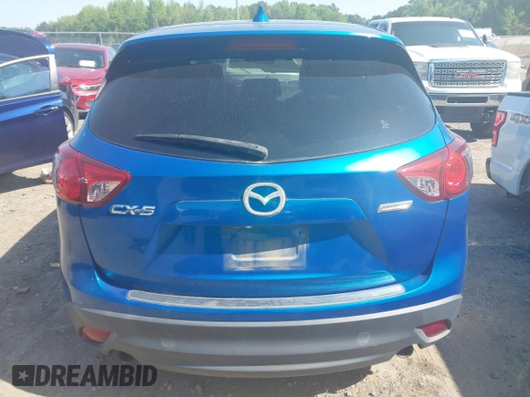 2013 Mazda CX-5 Grand Touring with VIN JM3KE2DEXD0123314, listed as a IAAI auction lot 42064266 with 288,935 mi miles. Bid and sale history available at carsss.com. Image 16.