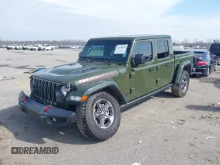 2023 Jeep Gladiator Rubicon with VIN 1C6JJTBGXPL586154, listed as a IAAI auction lot 41370352 with 11,207 mi miles and . Bid and sale history available at DreamBid. Image 17.