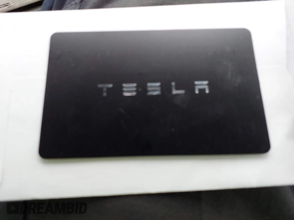 2022 Tesla Model Y Long Range with VIN 7SAYGAEE3NF337220, listed as a IAAI auction lot 41703912 with 46,319 mi miles and . Bid and sale history available at carsss.com. Image 11.