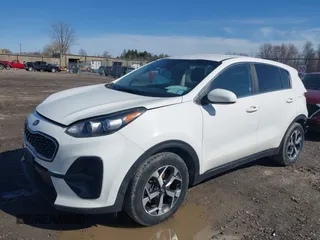 2020 Kia Sportage LX with VIN KNDPM3AC7L7643440, listed as a IAAI auction lot 41960904 with 102,165 mi miles. Bid and sale history available at carsss.com. Image 2.