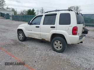 2002 Jeep Liberty Limited with VIN 1J4GL58K32W246480, listed as a IAAI auction lot 41832097 with 300,097 mi miles and . Bid and sale history available at carsss.com. Image 3.