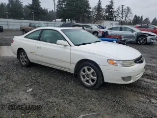 1999 Toyota Solara SE with VIN 2T1CF22P3XC241133, listed as a Copart auction lot 48490395 with 194,094 mi miles and Salvage Title. Bid and sale history available at DreamBid. Image 4.