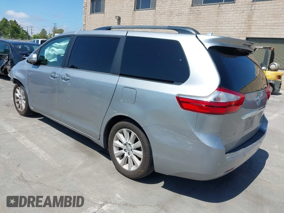2015 Toyota Sienna XLE with VIN 5TDYK3DC5FS594514, listed as a IAAI auction lot 42183673 with 120,978 mi miles and . Bid and sale history available at DreamBid. Image 3.