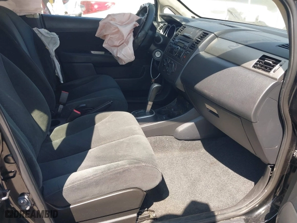2012 Nissan Versa S with VIN 3N1BC1CPXCK250702, listed as a IAAI auction lot 41899436 with 136,378 mi miles. Bid and sale history available at carsss.com. Image 5.
