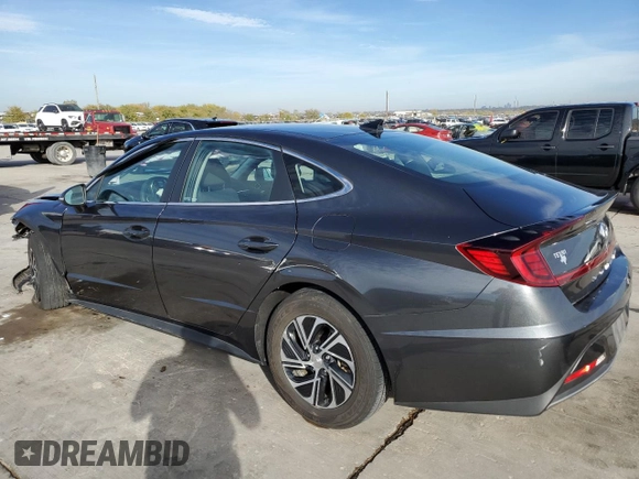 2022 Hyundai Sonata Hybrid Blue with VIN KMHL24JJ5NA051528, listed as a Copart auction lot 82478744 with 66,784 mi miles and Salvage Title. Bid and sale history available at carsss.com. Image 2.