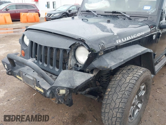 2012 Jeep Wrangler Unlimited Rubicon with VIN 1C4HJWFGXCL142804, listed as a IAAI auction lot 42183960 with 124,392 mi miles and . Bid and sale history available at DreamBid. Image 6.