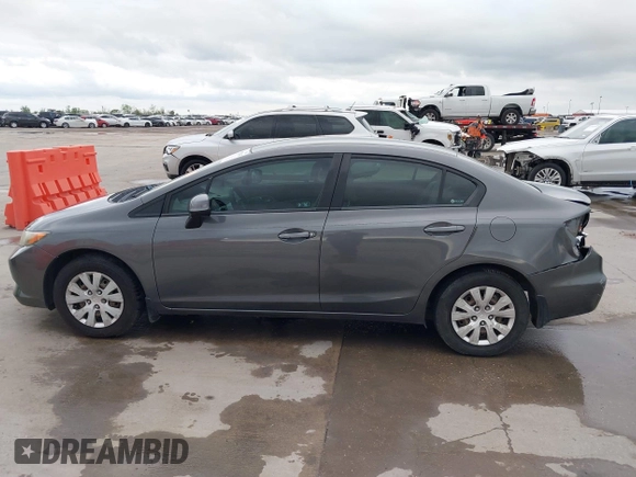 2012 Honda Civic LX z VIN 2HGFB2F51CH600546, wystawiony jako IAAI lot #41920265 z przebiegiem 196 599 mil mil oraz . Historia ofert i sprzedaży dostępna na DreamBid. Obrazek 14.