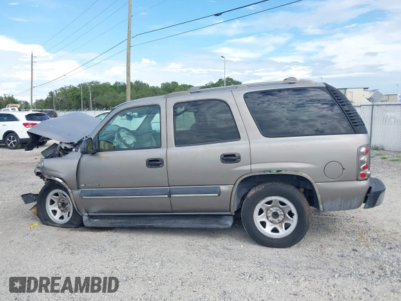 2002 Chevrolet Tahoe LS z VIN 1GNEC13Z72R258244, wystawiony jako IAAI lot #42639069 z przebiegiem Nie podano mil oraz . Historia ofert i sprzedaży dostępna na DreamBid. Obrazek 14.