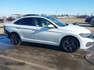 2024 Volkswagen Jetta SE with VIN 3VW7M7BU2RM031902, listed as a IAAI auction lot 42205832 with 31,274 mi miles and . Bid and sale history available at DreamBid. Image 14.