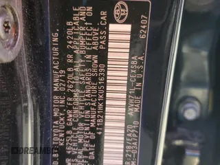 2019 Toyota Camry Hybrid LE z VIN 4T1B21HK1KU516390, wystawiony jako Copart lot #54856015 z przebiegiem 94 504 mil mil oraz Nie do naprawy • Non repairable. Historia ofert i sprzedaży dostępna na DreamBid. Obrazek 13.