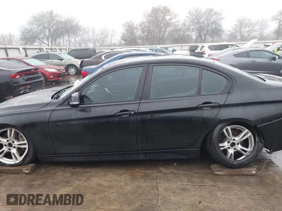 2014 BMW 3 Series 335i with VIN WBA3A9C57EF477662, listed as a IAAI auction lot 41435544 with 129,543 mi miles. Bid and sale history available at carsss.com. Image 15.