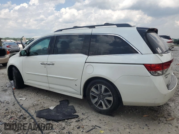 2014 Honda Odyssey Touring with VIN 5FNRL5H92EB020189, listed as a Copart auction lot 62311425 with Not provided miles and Clean title. Bid and sale history available at DreamBid. Image 2.