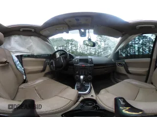 2009 Land Rover LR2 HSE z VIN SALFT24N09H146327, wystawiony jako IAAI lot #42470153 z przebiegiem 152 507 mil mil oraz . Historia ofert i sprzedaży dostępna na DreamBid. Obrazek 17.
