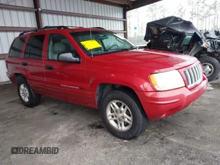 2004 Jeep Grand Cherokee with VIN 1J8GX48SX4C329289, listed as a IAAI auction lot 41631610 with 212,362 mi miles and . Bid and sale history available at DreamBid. Image 1.