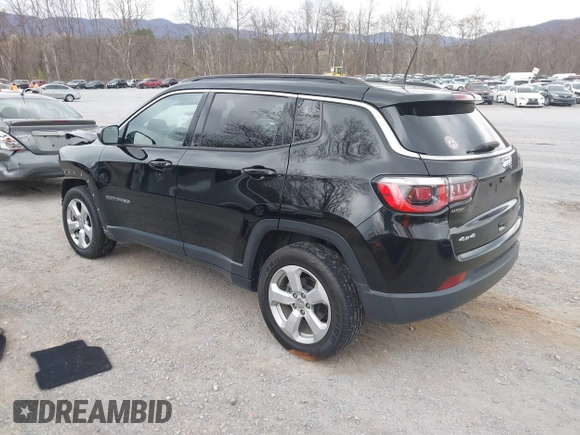 2019 Jeep Compass Latitude with VIN 3C4NJDBB1KT754314, listed as a IAAI auction lot 41869595 with 65,162 mi miles. Bid and sale history available at carsss.com. Image 3.