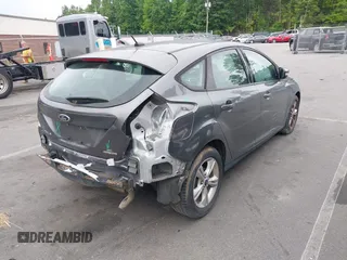 2014 Ford Focus SE with VIN 1FADP3K20EL104271, listed as a IAAI auction lot 39596262 with 81,021 mi miles. Bid and sale history available at carsss.com. Image 4.