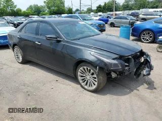 2016 Cadillac CTS Luxury Collection AWD with VIN 1G6AX5SX0G0102225, listed as a Copart auction lot 60400525 with 115,935 mi miles and Salvage title. Bid and sale history available at DreamBid. Image 4.