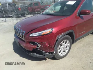 2014 Jeep Cherokee Latitude with VIN 1C4PJMCS7EW229179, listed as a IAAI auction lot 41793922 with 137,042 mi miles. Bid and sale history available at carsss.com. Image 6.