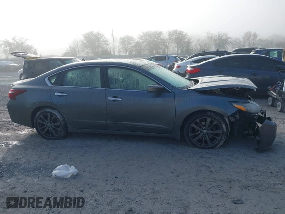 2018 Nissan Altima 2.5 SR with VIN 1N4AL3AP3JC251822, listed as a IAAI auction lot 41875517 with 135,808 mi miles. Bid and sale history available at carsss.com. Image 13.
