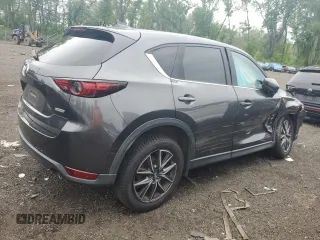 2018 Mazda CX-5 Grand Touring с VIN JM3KFBDM8J0424633, выставлен на аукционе Copart как лот 59888035 с пробегом 77 721 миль миль и Списание • Salvage title. История ставок и продаж доступна на DreamBid. Изображение 3.