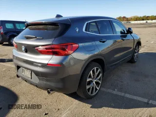2018 BMW X2 xDrive28i z VIN WBXYJ5C30JEF79472, wystawiony jako Copart lot #65888442 z przebiegiem 60 941 mil mil oraz . Historia ofert i sprzedaży dostępna na DreamBid. Obrazek 4.