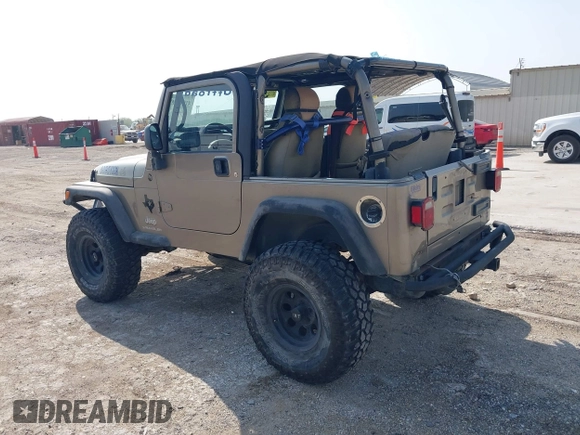 2005 Jeep Wrangler SE with VIN 1J4FA29S25P328827, listed as a IAAI auction lot 41917807 with 157,562 mi miles. Bid and sale history available at carsss.com. Image 3.