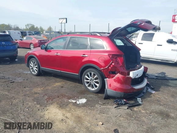 2015 Mazda CX-9 Grand Touring with VIN JM3TB3DA7F0448943, listed as a IAAI auction lot 41888414 with 104,052 mi miles. Bid and sale history available at carsss.com. Image 3.
